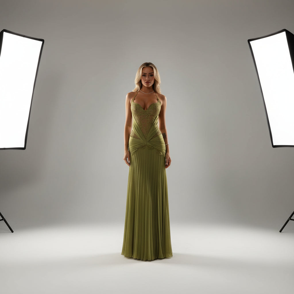 Woman in a green evening gown standing outdoors at night with 'Eightree' branding.